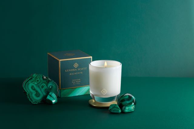 The home collection features four soy wax candles that reference Scott’s favorite gemstones: KS Signature, suggests subtle notes of lily and blonde woods, Rose Quartz, involves a light, romantic bouquet of wild peony and rose petals with hints of vanilla and raspberry nectar.  The Malachite candle incorporates notes of exotic frankincense and warm amber while the Amethyst one features a blend of blackberry and lilac blossoms and sandalwood for balance.  Kendra Scott home collection is available online and at Kendra Scott store locations. They range in price from $25 for a 3-oz.votive, $65 for an 8-oz. tumbler and 3-oz. votive gift set of three for $70. Shop the Kendra Scott Home Collection