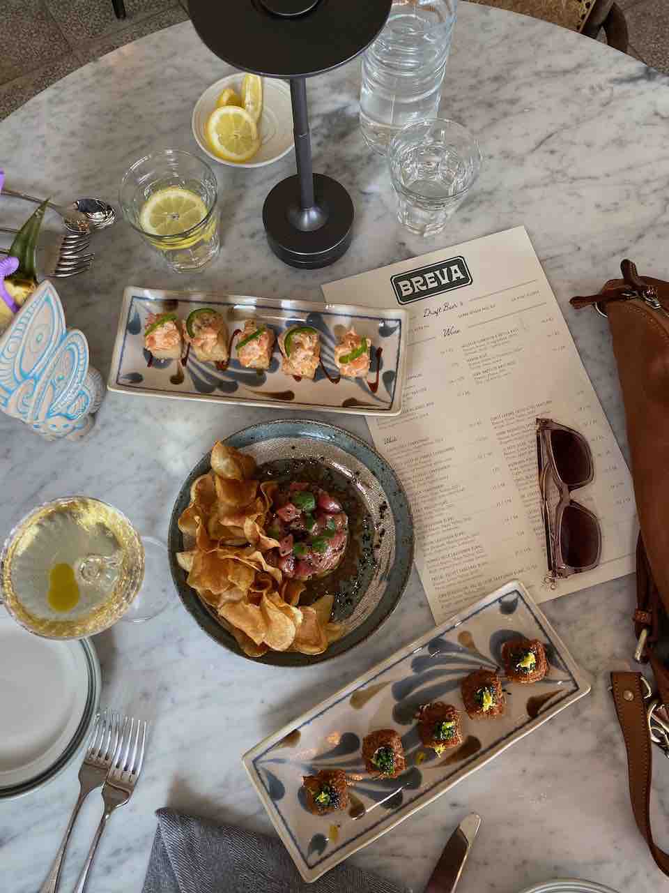 breva flatlay Taste your way through the best oyster bars in NYC. From rooftop lounges to candlelit gems, find your perfect shuck-worthy spot.