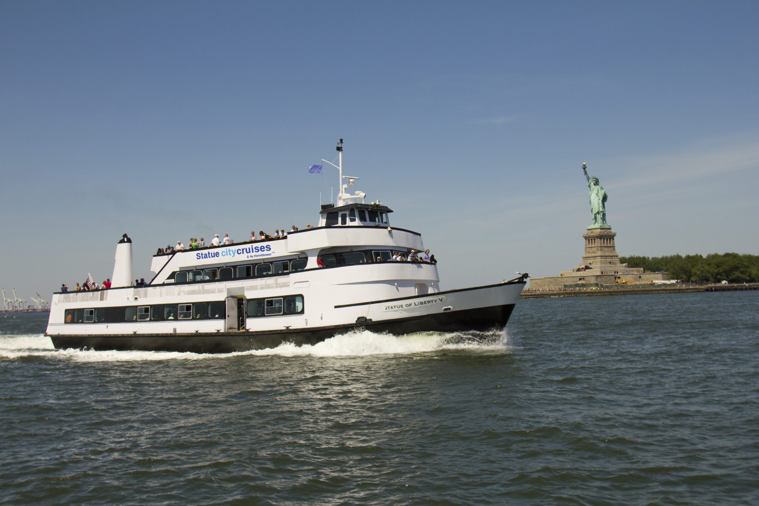 Statue Line Cruises' fleet in New York City. July 4 in NYC: The Ultimate Guide to Fireworks, Cruises & America 250 Celebrations